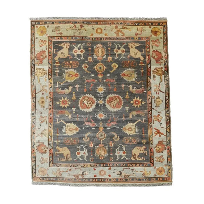  Ancient Caravan Hand Knotted Area Rug, a stunning tribute to time-honored design and craftsmanship. Inspired by rich, traditional patterns, this rug brings a sense of history and luxury to your home with its intricate details and warm hues.