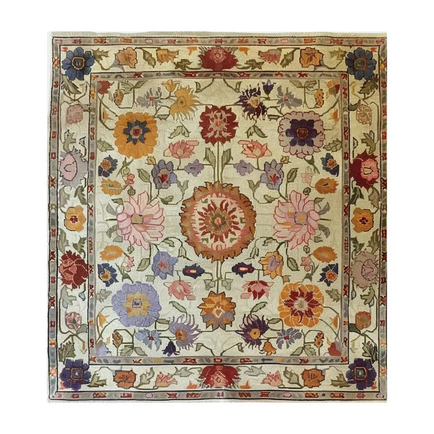 Petals of Grace Hand Knotted Area Rug, a masterpiece of elegance and craftsmanship. With its delicate floral patterns and luxurious texture, this rug adds a graceful and refined touch to any living space.