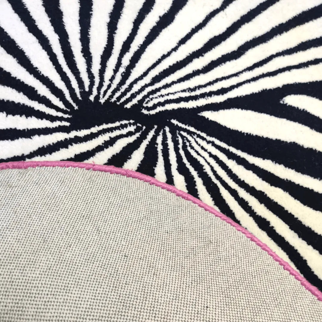 Step onto the Pink Sun Hand Tufted Wool Rug