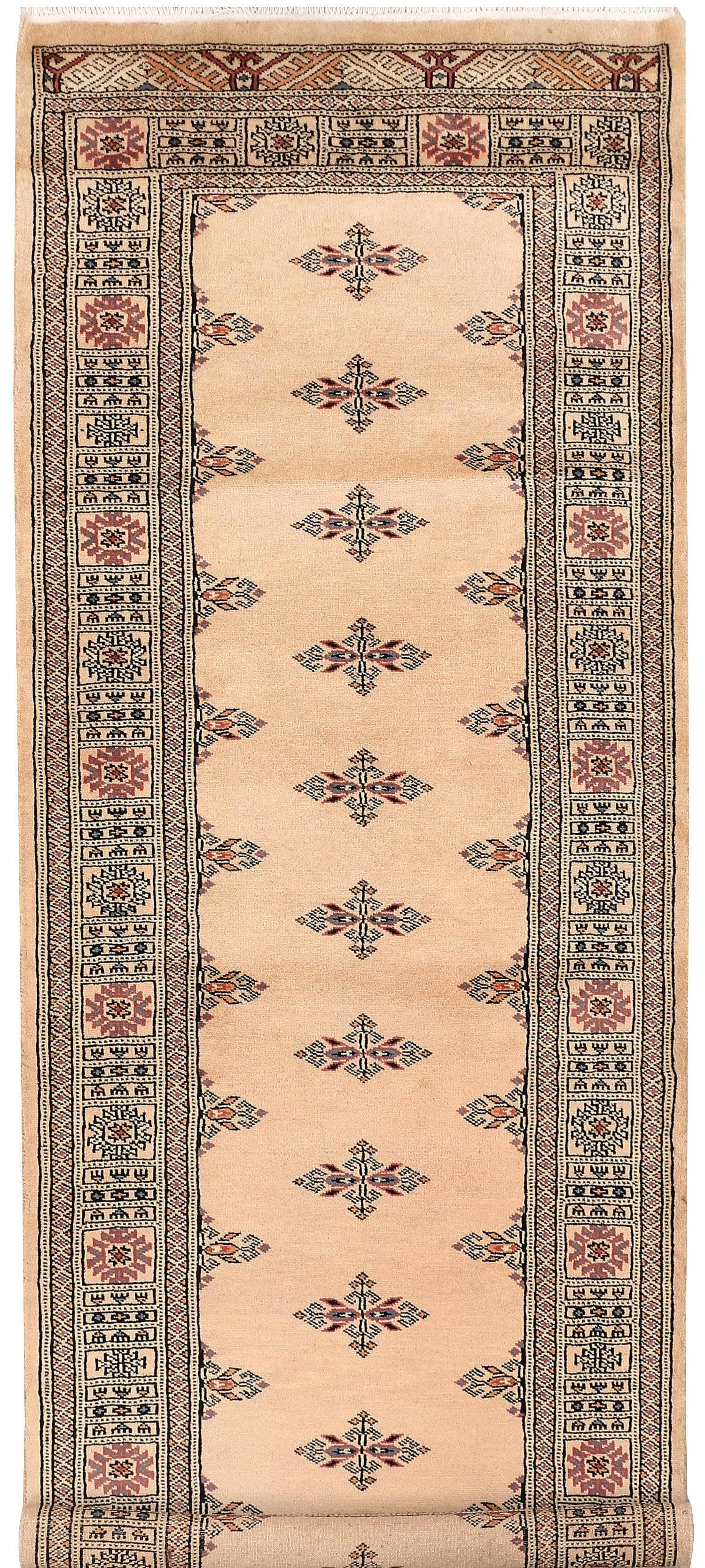 The Cream Javarak wool hand-knotted area rug runner features a delicate, neutral design with subtle texture. Its high-quality craftsmanship and soft wool provide both elegance and durability for any hallway or narrow space.