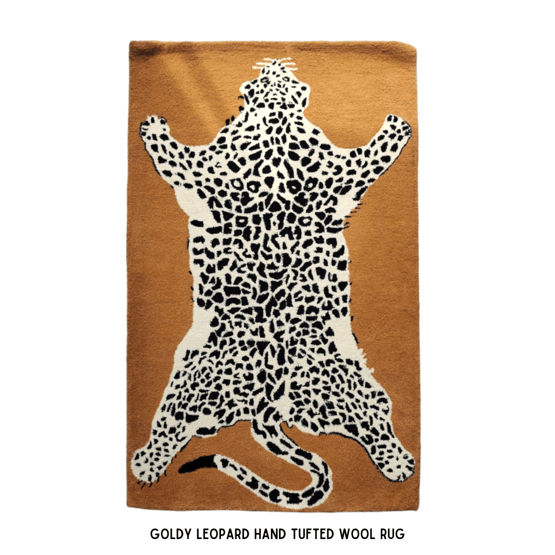 The Goldy Leopard hand-tufted wool rug features a captivating leopard print in elegant gold tones. Its soft wool pile offers comfort while adding a bold, luxurious touch to any room.