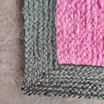 Black and Pink Braided Jute Rug